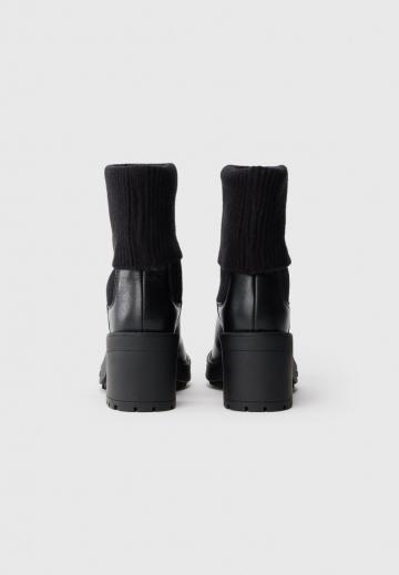 Высокие сапоги