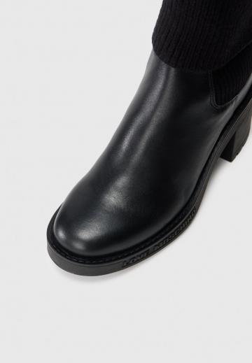 Высокие сапоги