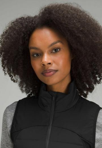 Пуховой жилет