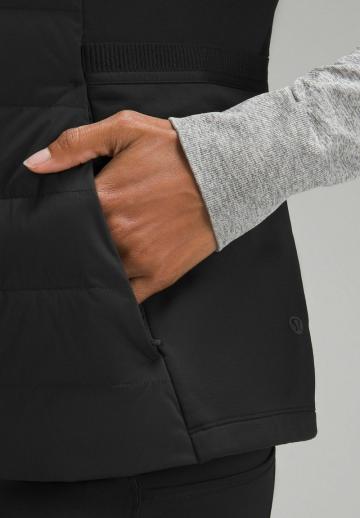 Пуховой жилет