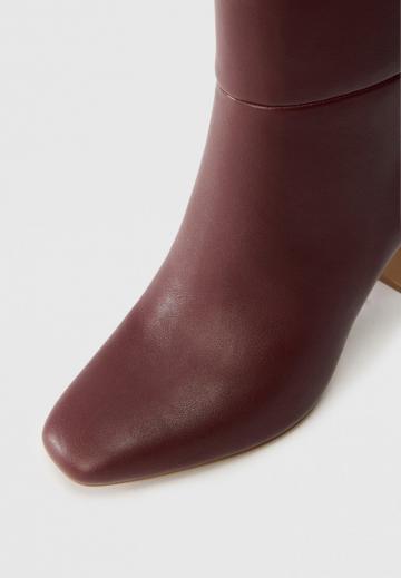 Высокие сапоги