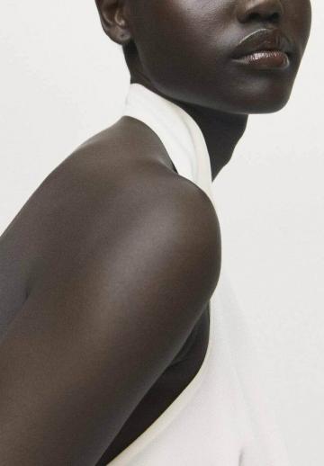 Блузка без рукавов