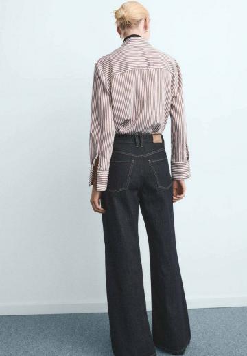 Клешеные джинсы