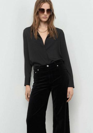 Клешеные джинсы