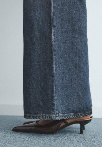 Клешеные джинсы