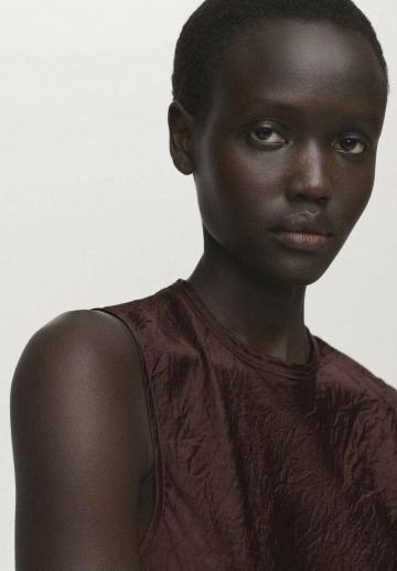 Блузка без рукавов