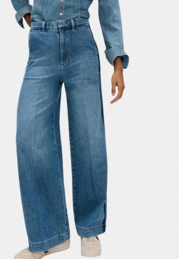 Клешеные джинсы
