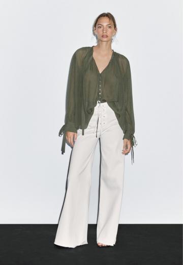 Клешеные джинсы