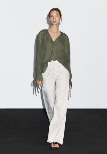 Клешеные джинсы