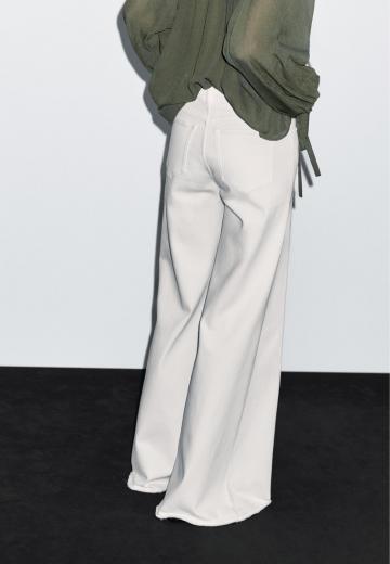 Клешеные джинсы