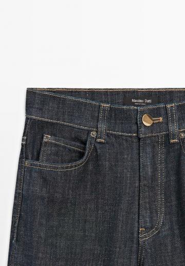 Клешеные джинсы