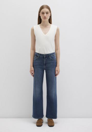 Клешеные джинсы