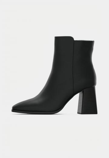 Полусапожки на высоком каблуке