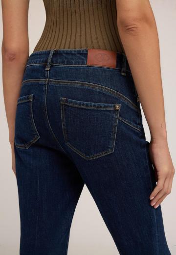 Клешеные джинсы