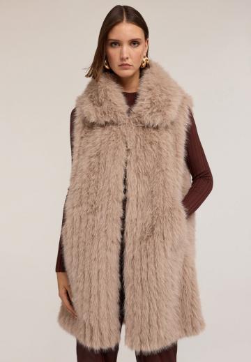 Длинный жилет