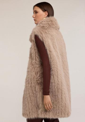 Длинный жилет