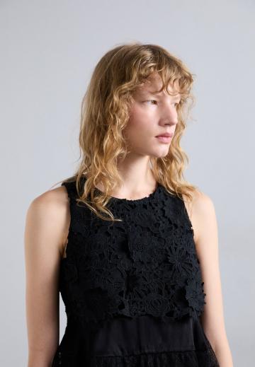 Блузка без рукавов