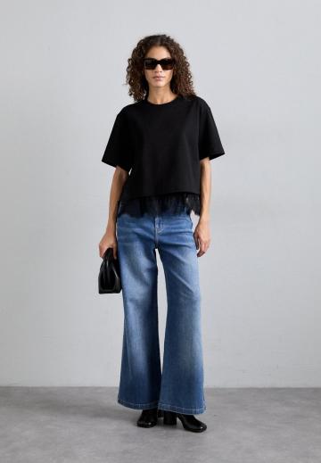 Клешеные джинсы