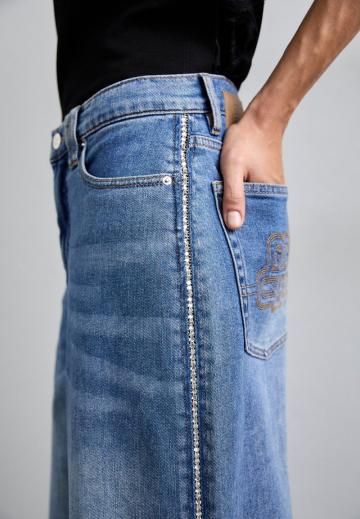 Клешеные джинсы