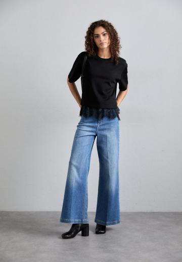 Клешеные джинсы