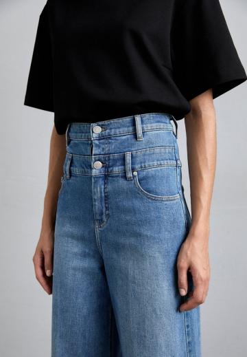 Клешеные джинсы