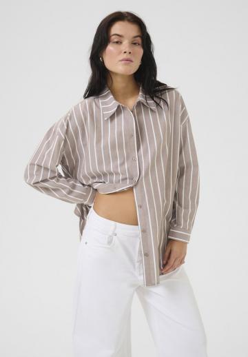 Длинная блузка