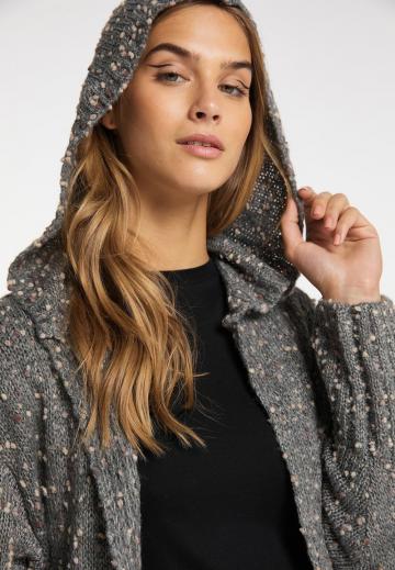 Длинный жилет