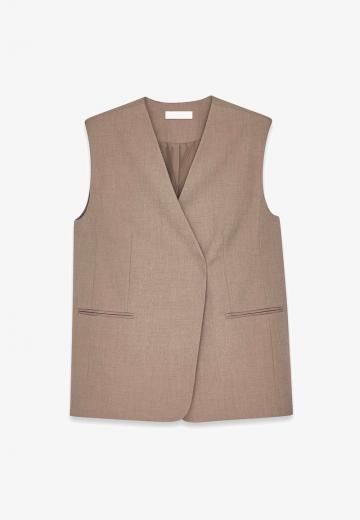 Длинный жилет