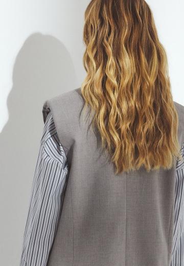 Длинный жилет