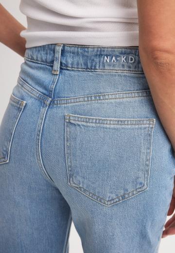 Клешеные джинсы