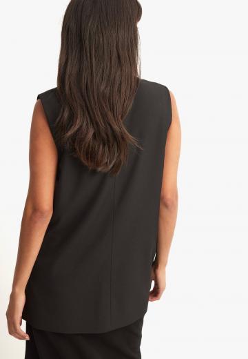 Длинный жилет