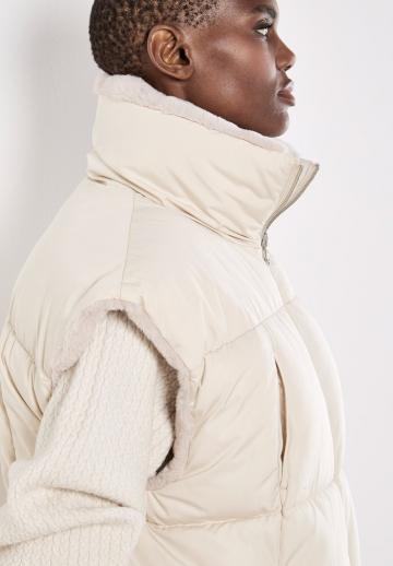 Длинный жилет