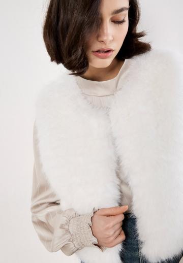 Пуховой жилет