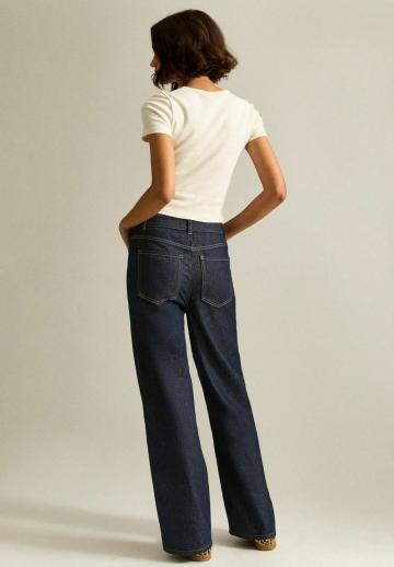 Клешеные джинсы