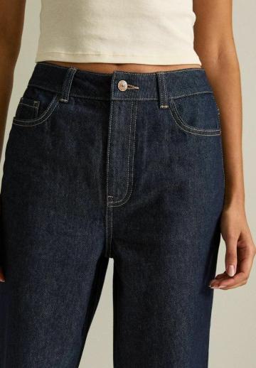 Клешеные джинсы