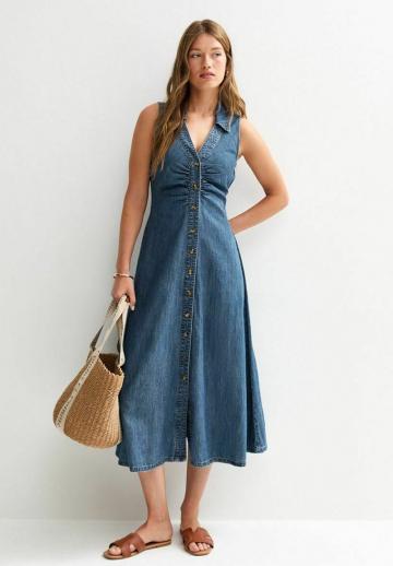 Джинсовая жилетка