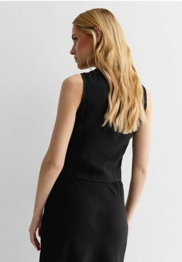 Джинсовая жилетка