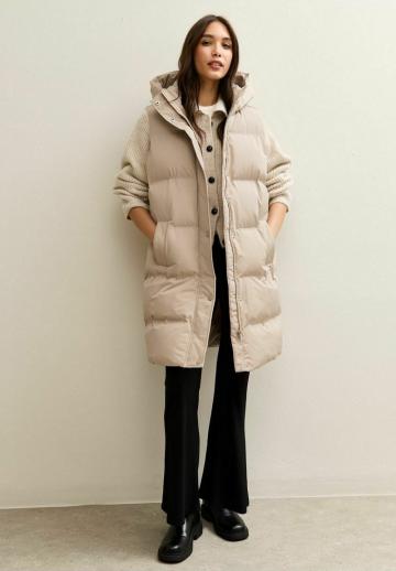 Длинный жилет