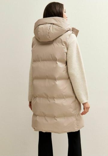 Длинный жилет