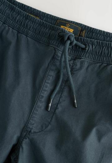 Брюки с накладными карманами