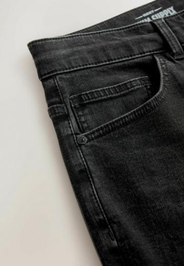 Клешеные джинсы