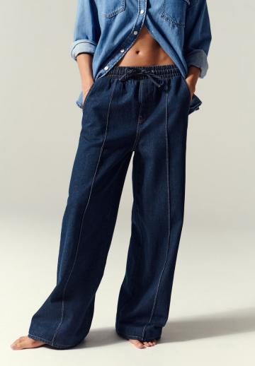 Клешеные джинсы