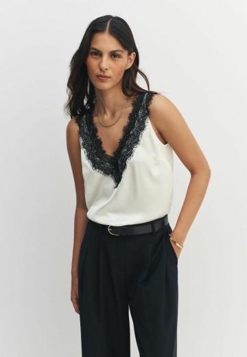 Блузка без рукавов