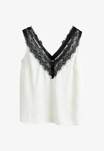 Блузка без рукавов