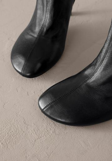 Высокие сапоги