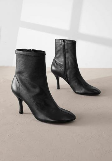 Высокие сапоги