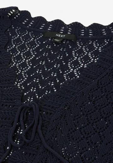 Вязаный жилет