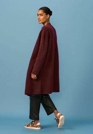 Длинный жилет