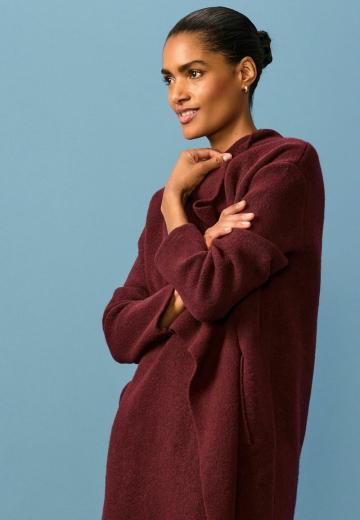 Длинный жилет