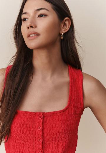 Блузка без рукавов